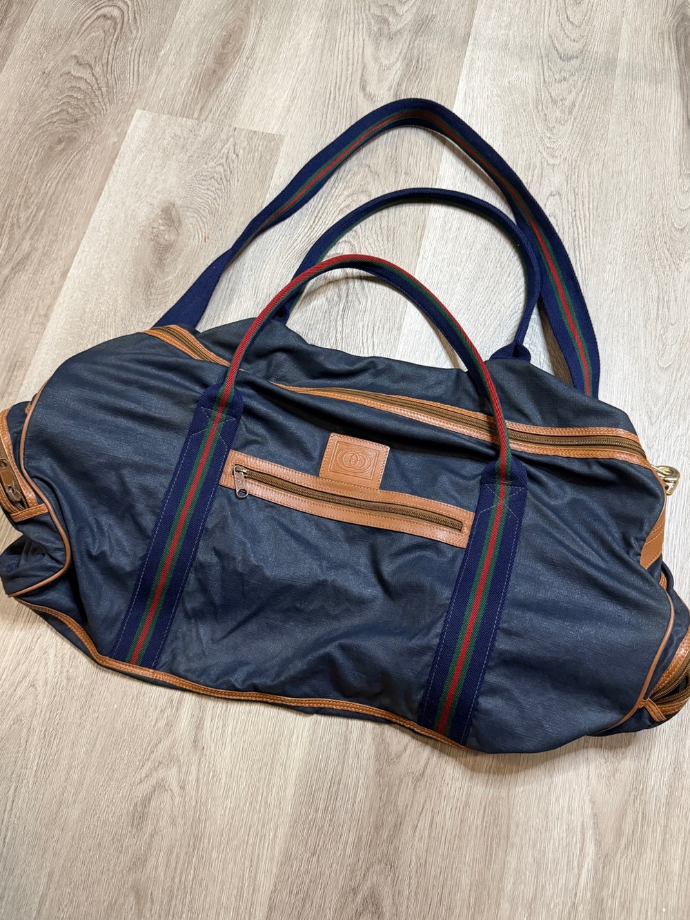 Gucci Navy Duffel Bag with Tan Leather Trim and Red-Green Stripe Webbing